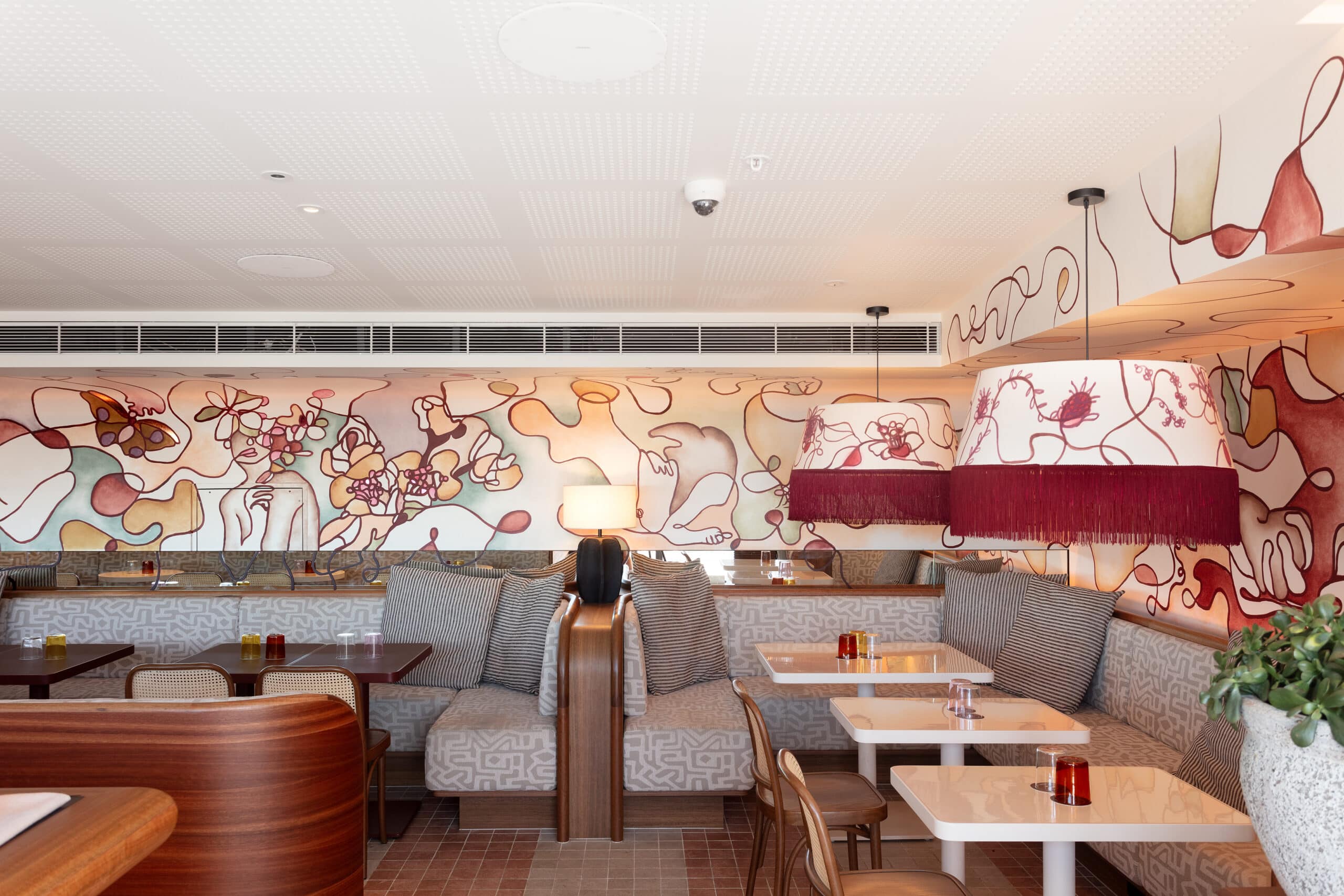 Line drawing mural by George Buchanan at Monica rooftop bar at 25hours The Olympia hotel Sydney