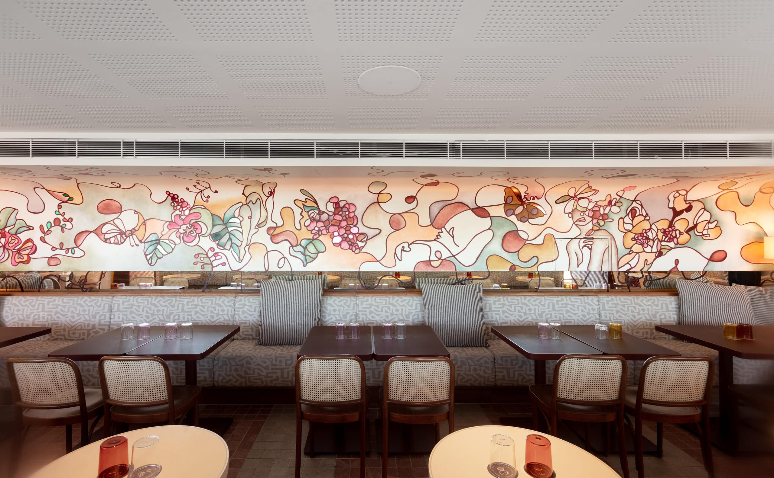 Line drawing mural by George Buchanan at Monica rooftop bar at 25hours The Olympia hotel Sydney